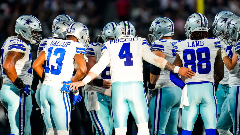 Dallas Cowboys quarterback Dak Prescott (4) in the huddle while on