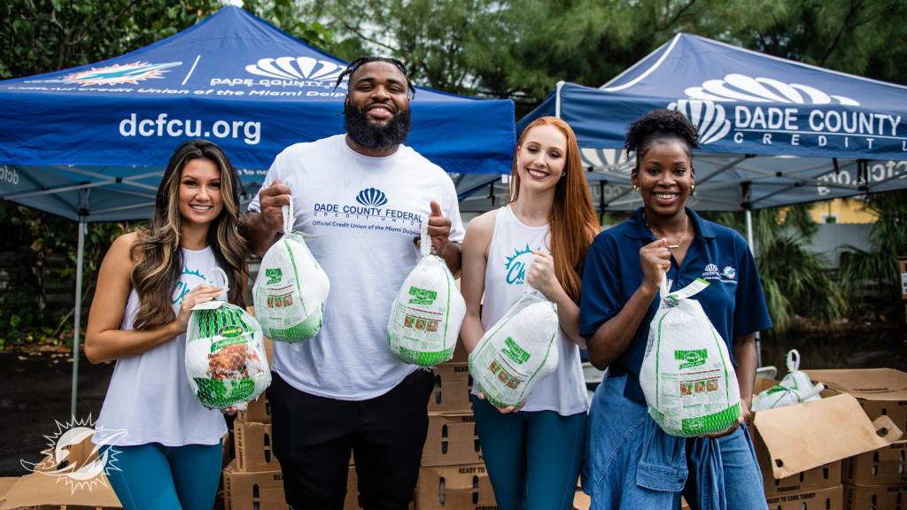 Miami Dolphins score within the community with Annual Thanksgiving  Distribution