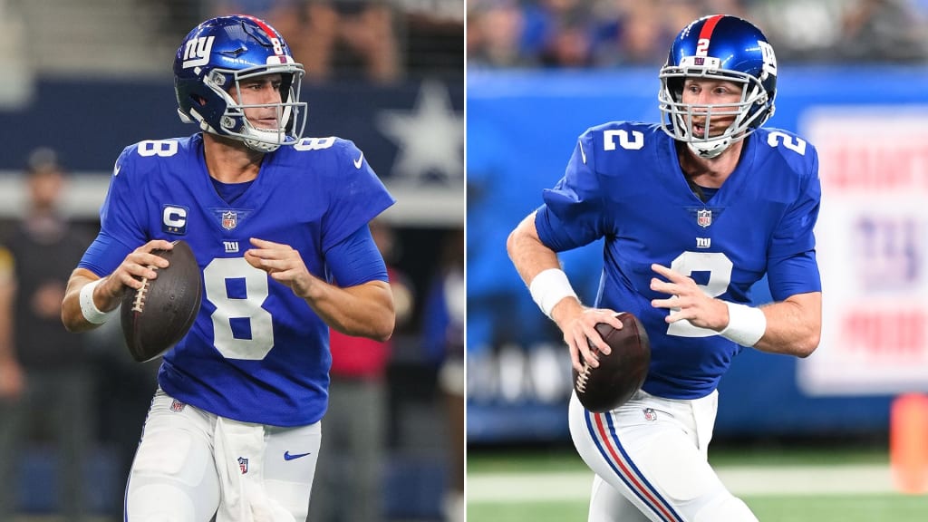 New York Giants quarterback Eli Manning reacts after Reuben Droughns runs  for a 1 yard touchdown in the second quarter against the Dallas Cowboys at  Giants Stadium in East Rutherford, New Jersey