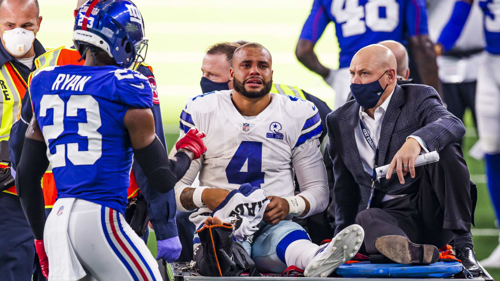 Dak Prescott has left the field with an apparent injury to his