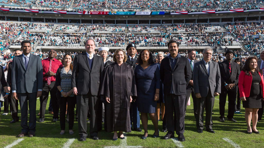 51 new Americans take the oath of citizenship at Jaguars game