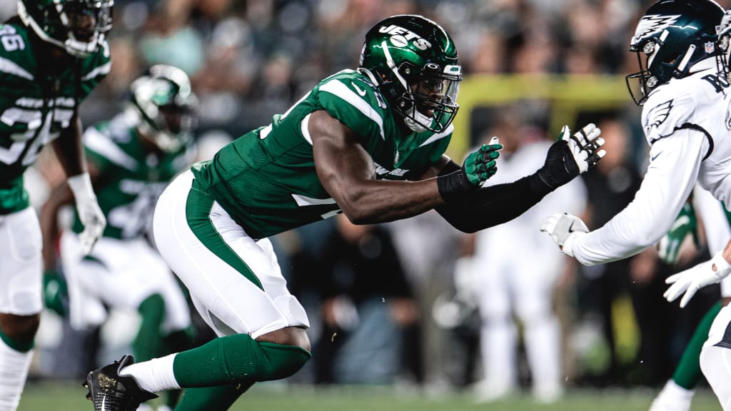 New York Jets defensive end Micheal Clemons (72) runs against the