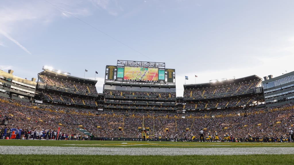 View of Lambeau Field scoreboard with image of Lombardi trophies