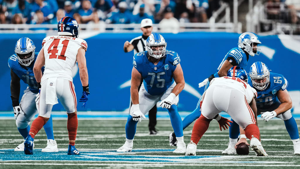 Detroit Lions players warmup before an NFL football game against