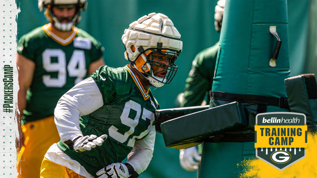 Green Bay Packers defensive end Dean Lowry (94) is blocked by