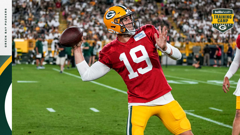 Green Bay Packers quarterback Danny Etling (19) runs for a