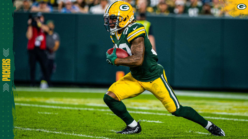 Green Bay Packers running back Kylin Hill (32) runs the ball