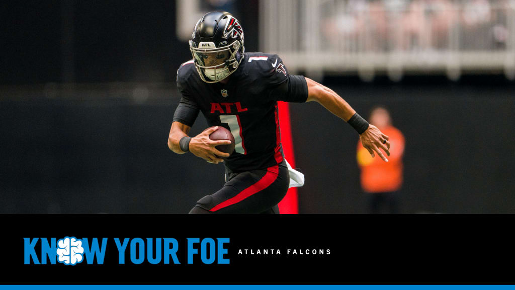 Atlanta Falcons players celebrate after an interception by