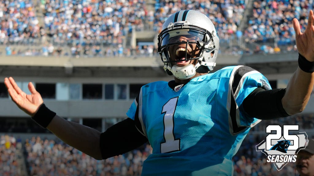 Carolina Panthers' Greg Olsen (88) celebrates with Cam Newton (1) after  Olsen passed 1,000 yards receiving in the first half of an NFL football  game against the Atlanta Falcons in Charlotte, N.C., …