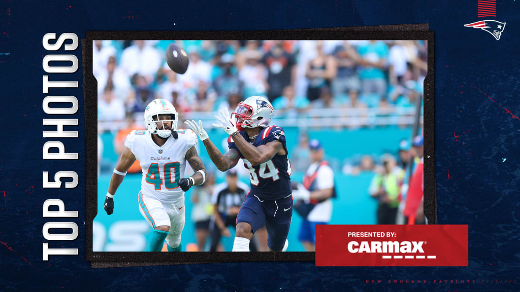 New england patriots vs miami dolphins hi-res stock photography