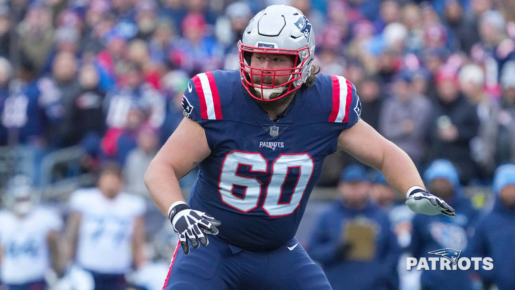 New England Patriots center David Andrews (60) walks off the field