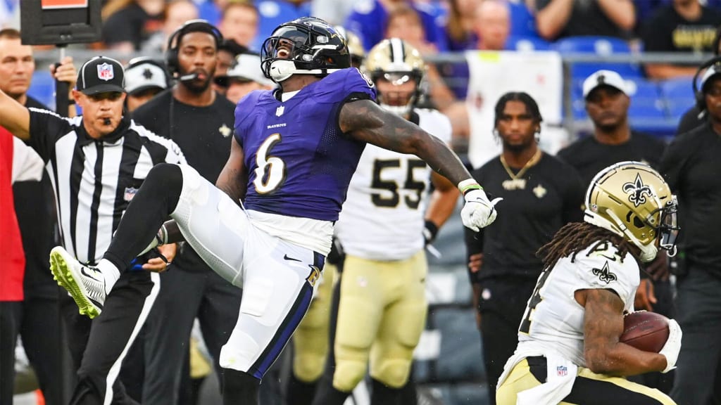 Baltimore Ravens linebacker Patrick Queen (6) greets quarterback Lamar  Jackson prior to an NFL preseason football game against the New Orleans  Saints, Saturday, Aug. 14, 2021, in Baltimore. (AP Photo/Nick Wass Stock