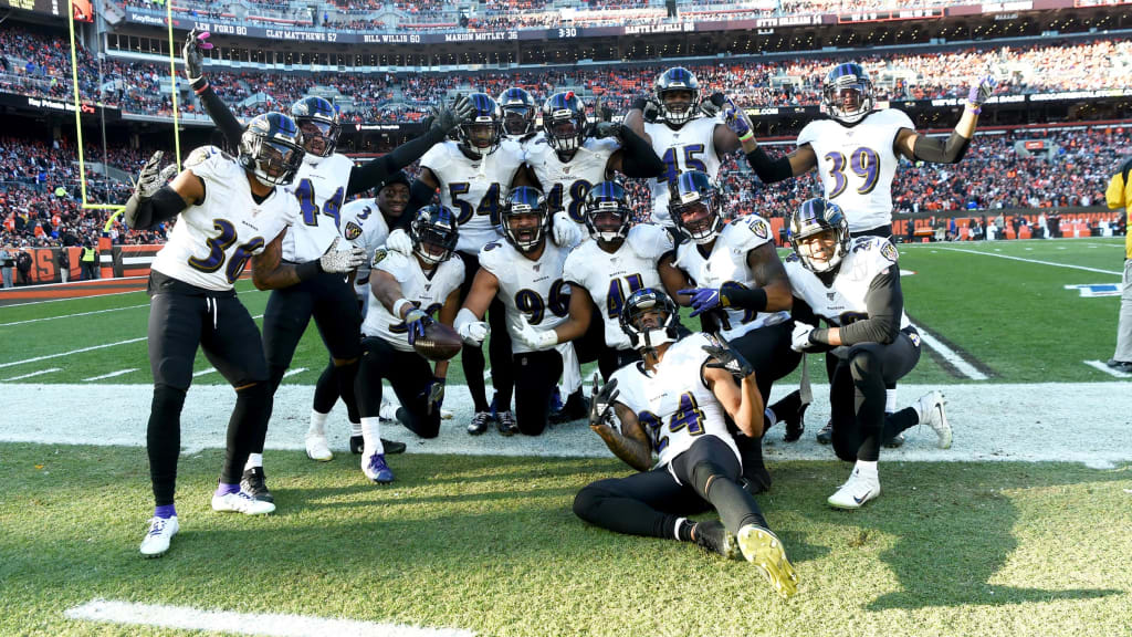 Ravens win 11th straight, clinch top seed in AFC playoffs