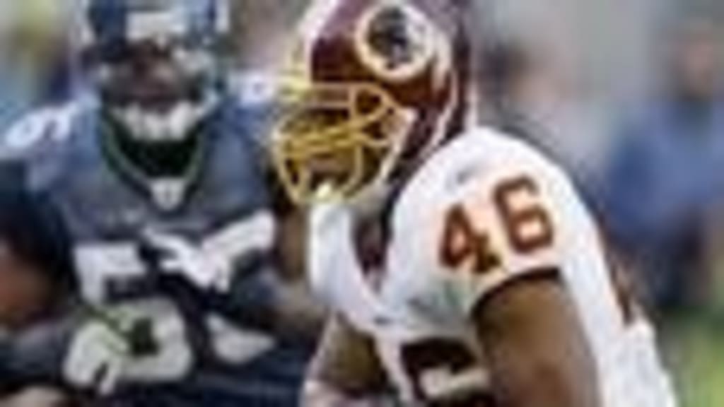 Washington Redskins Sean Taylor (21) and Rock Cartright (31) tie