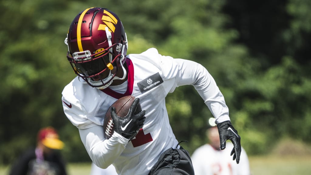 Washington Commanders wide receiver Kazmeir Allen catches a pass