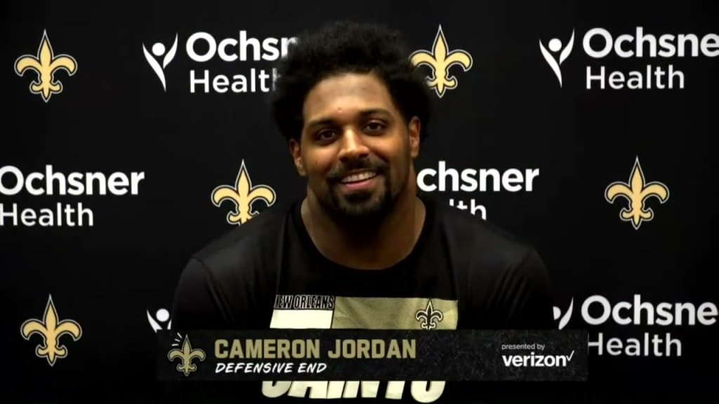 Cam Jordan placed on COVID list; Deonte Harris suspended