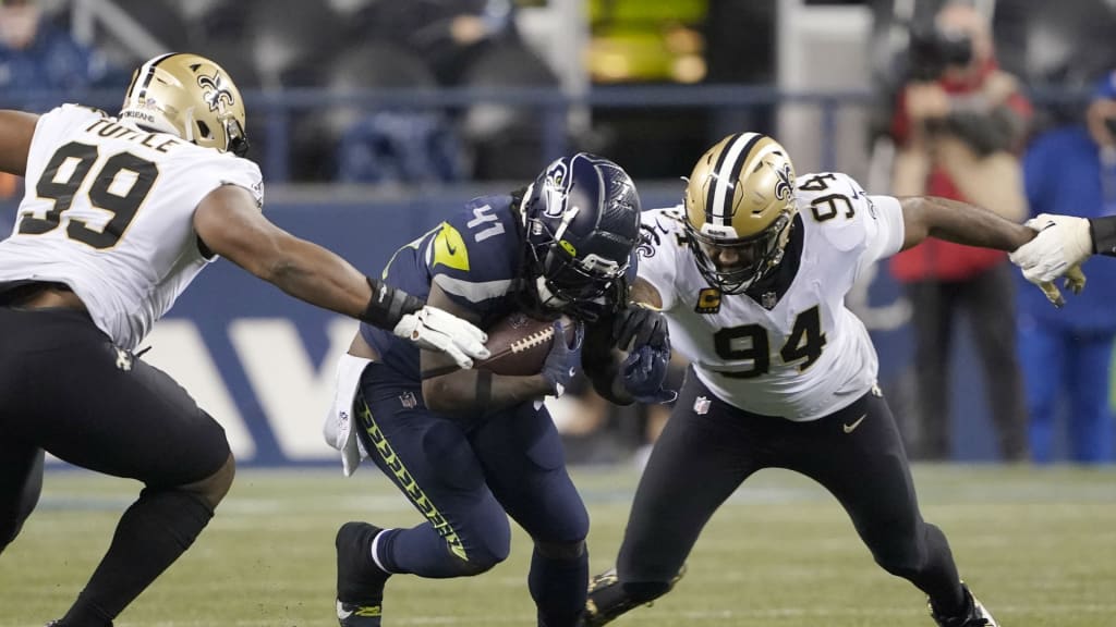 The Seattle Seahawks huddle during an NFL football game against the New  Orleans Saints in New Orleans, Sunday, Oct. 9, 2022. The Saints won 39-32.  (AP Photo/Gerald Herbert Stock Photo - Alamy