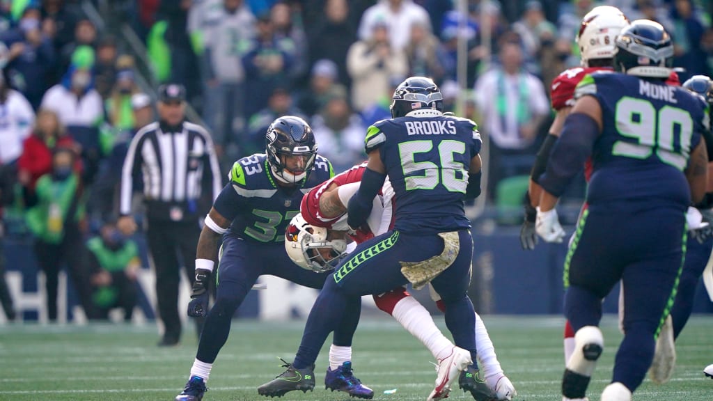 Seattle Seahawks defensive tackle Bryan Mone (90) prepares for the