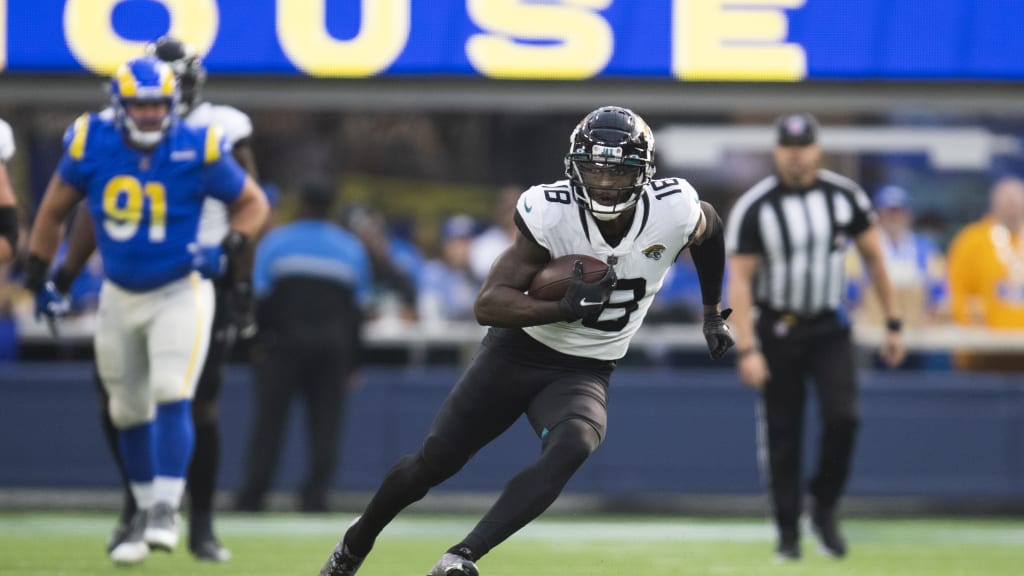 Seattle Seahawks wide receiver Laquon Treadwell (18) carries the ball  before an NFL football game against the Las Vegas Raiders, Sunday, Nov. 27,  2022, in Seattle, WA. The Raiders defeated the Seahawks