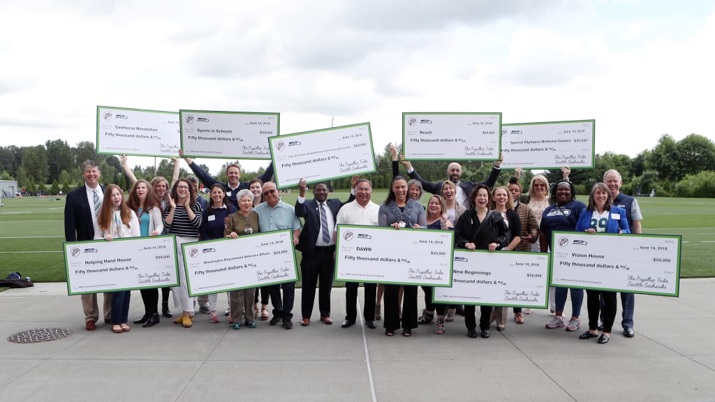 Seahawks partner with local company to upcycle banners and raise money for  charity