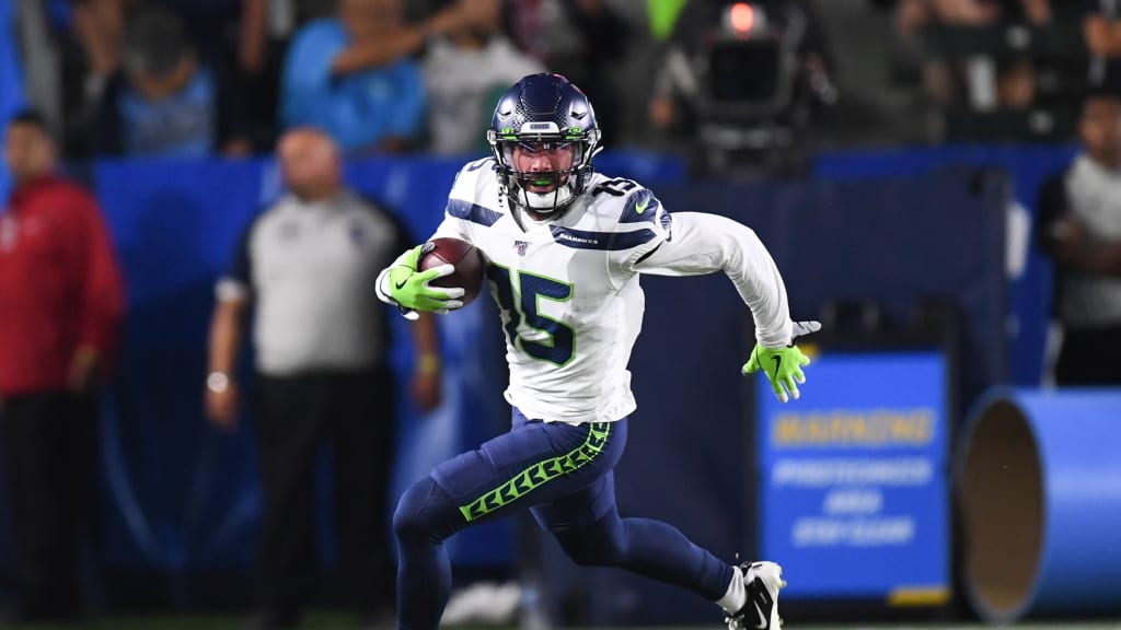 Seattle Seahawks wide receiver John Ursua (15) is tackled by Las Vegas  Raiders cornerback Amik …