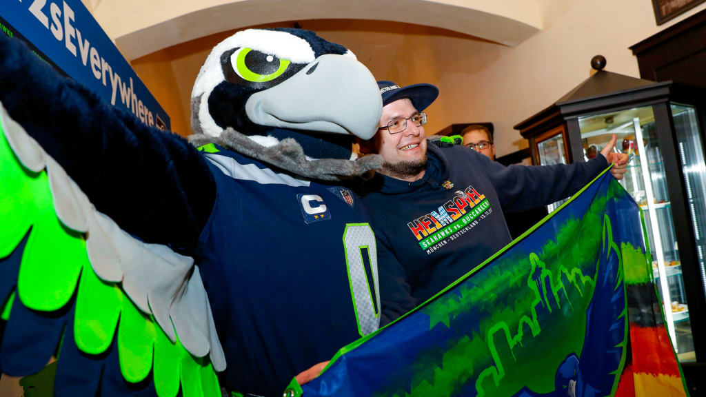 Seahawks' mascot, Blitz poses for a photo with fans during the Seattle  Seahawks Pub Event at the Augustiner Stammhaus pub, on Friday, Nov. 11 2022  in Munich. (AP Photo/Omer Messinger Stock Photo 