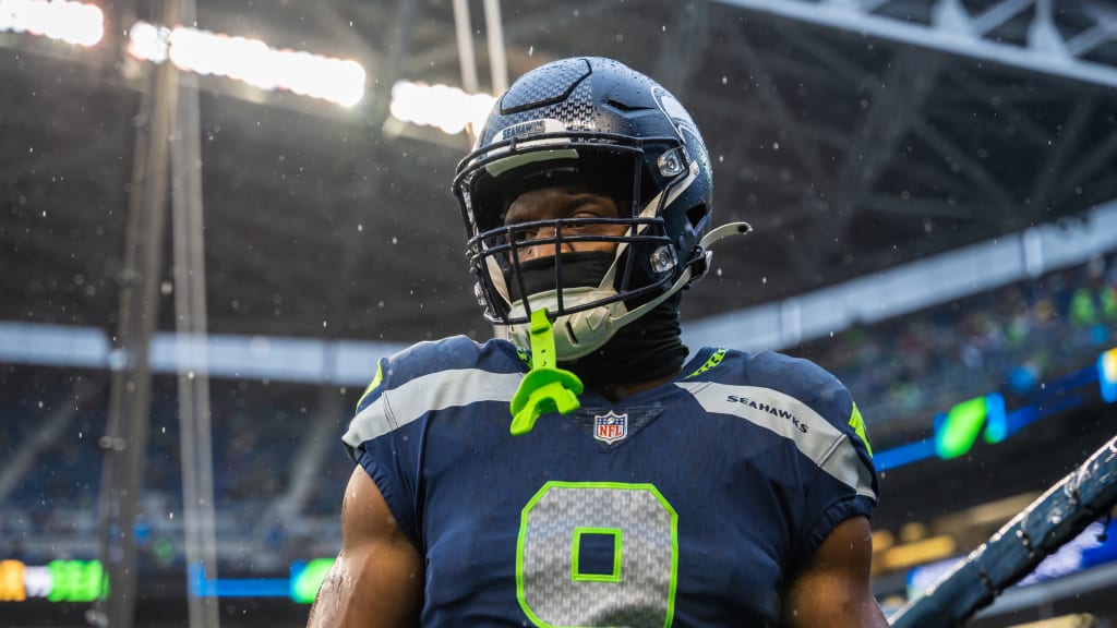 Running back Curt Warner of the Seattle Seahawks rushes for yards