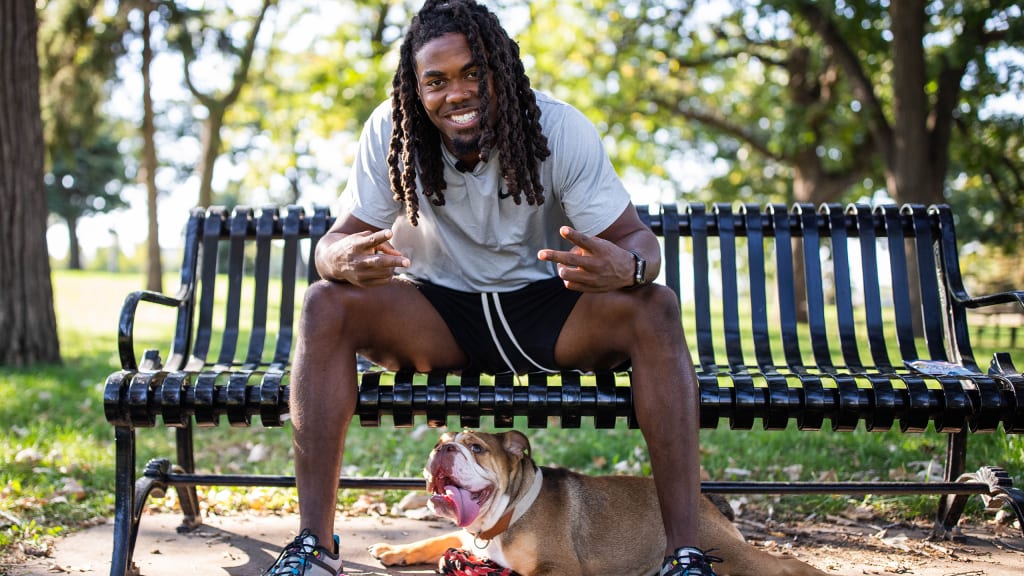 Purple Pups: K.J. Osborn Grateful for 'Best Friend' in Larry the Bulldog