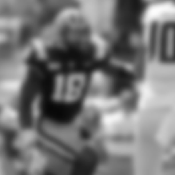 LSU linebacker K'Lavon Chaisson (18) pressures quarterback