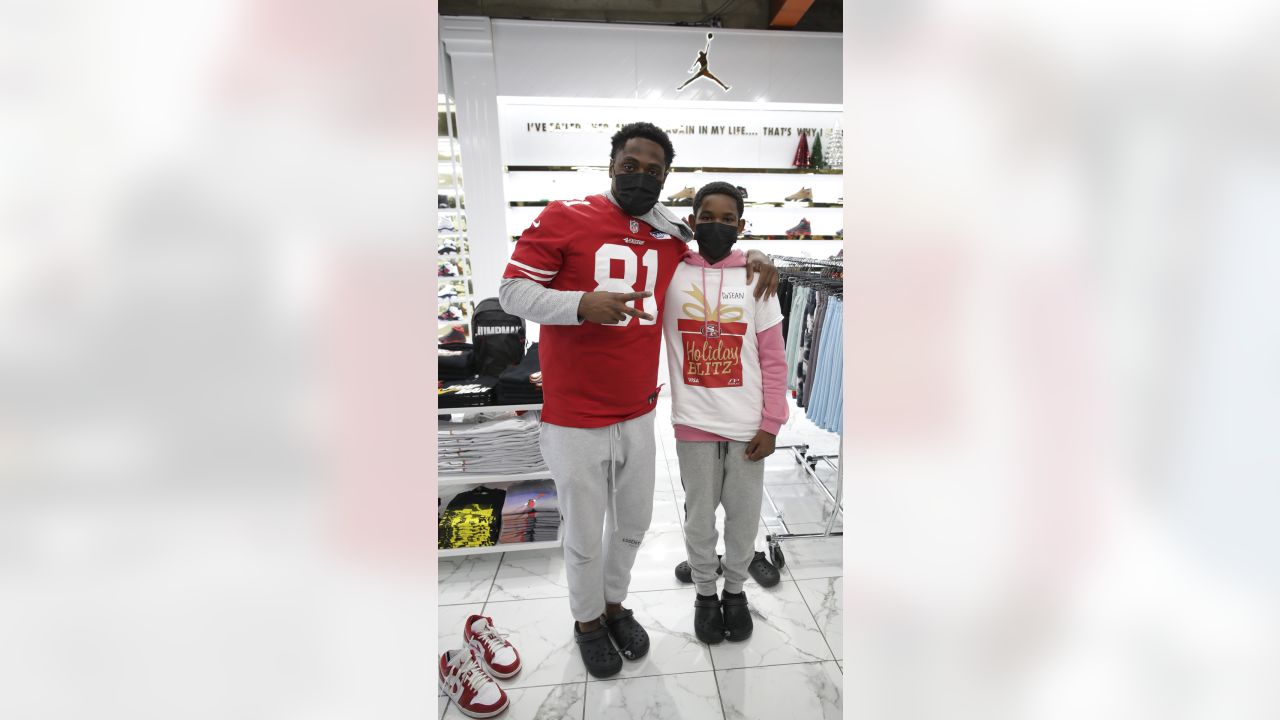 49ers Players Host 15 Students from SPAAT for a Holiday Blitz Shopping Event