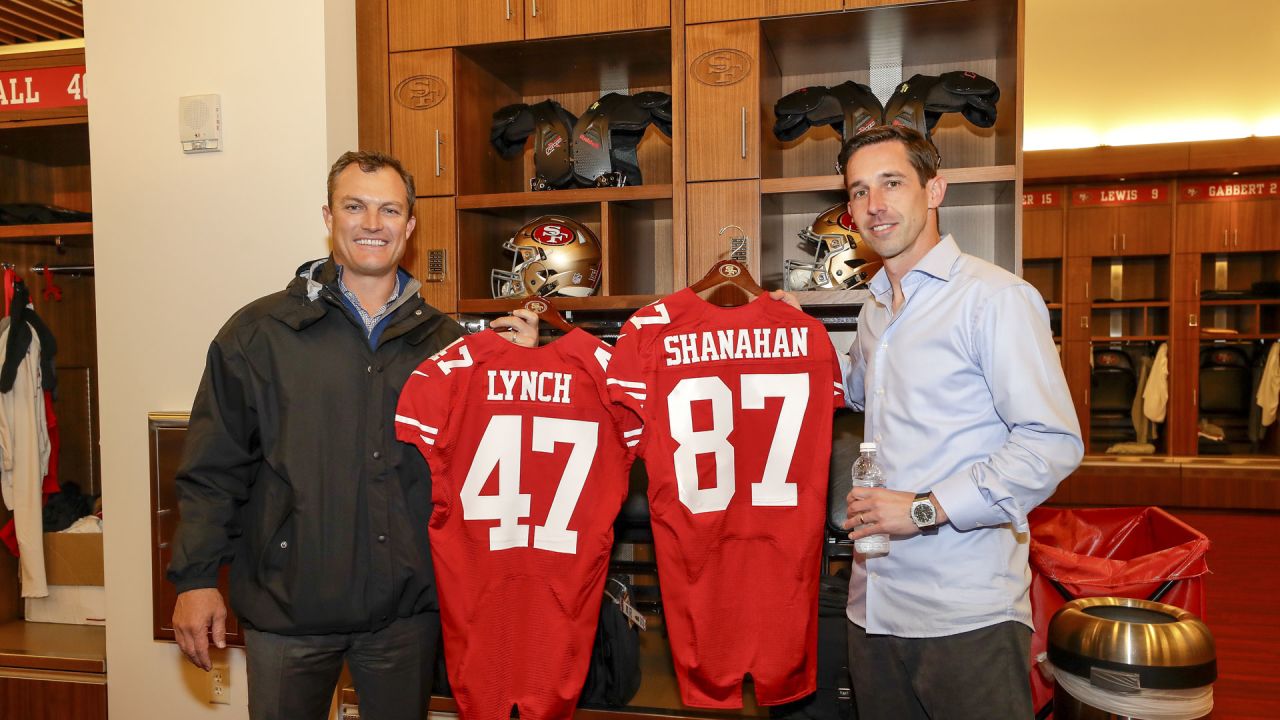 Shanahan and Lynch Presented with Team Jerseys 