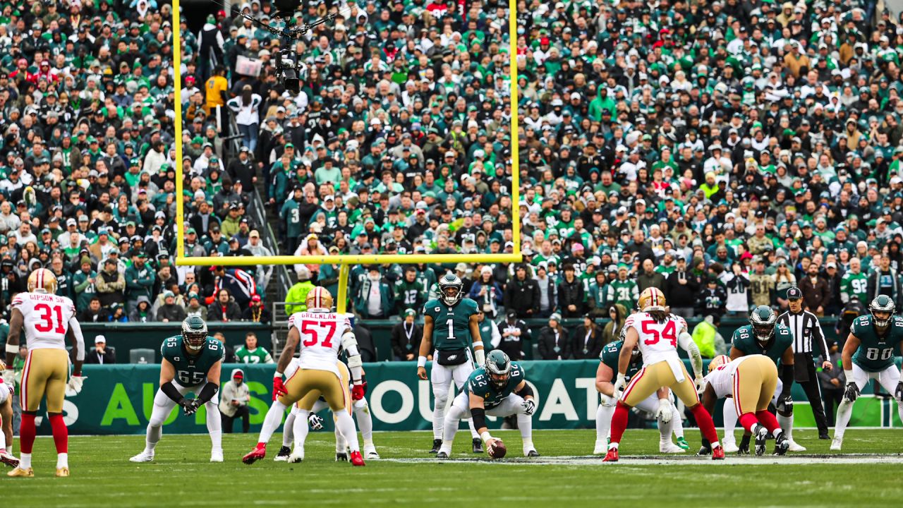 San Francisco 49ers vs. Philadelphia Eagles. Fans support on NFL Game.  Silhouette of supporters, big screen with two rivals in background Stock  Photo - Alamy