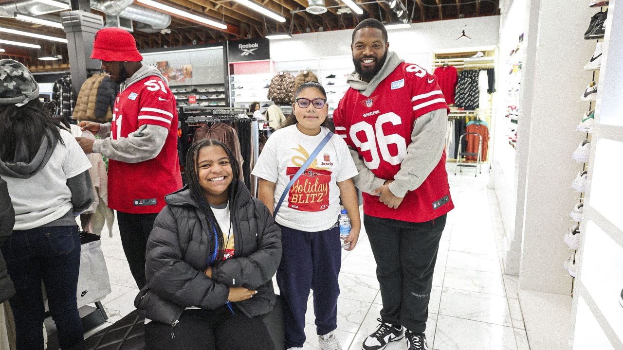 49ers Players Host 15 Students from SPAAT for a Holiday Blitz Shopping Event