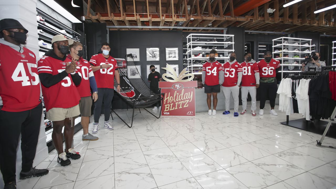 49ers Players Host 15 Students from SPAAT for a Holiday Blitz Shopping Event