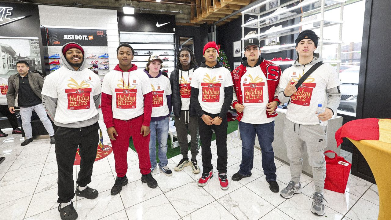 49ers Players Host 15 Students from SPAAT for a Holiday Blitz Shopping Event