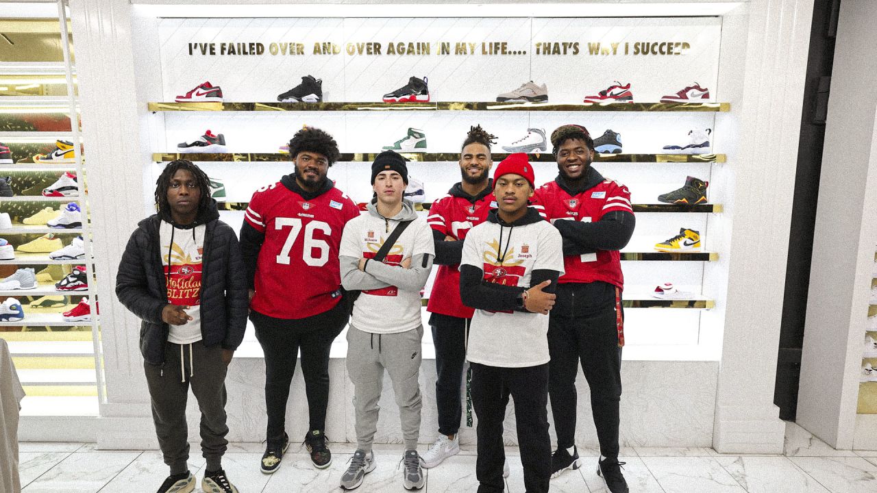 49ers Players Host 15 Students from SPAAT for a Holiday Blitz Shopping Event