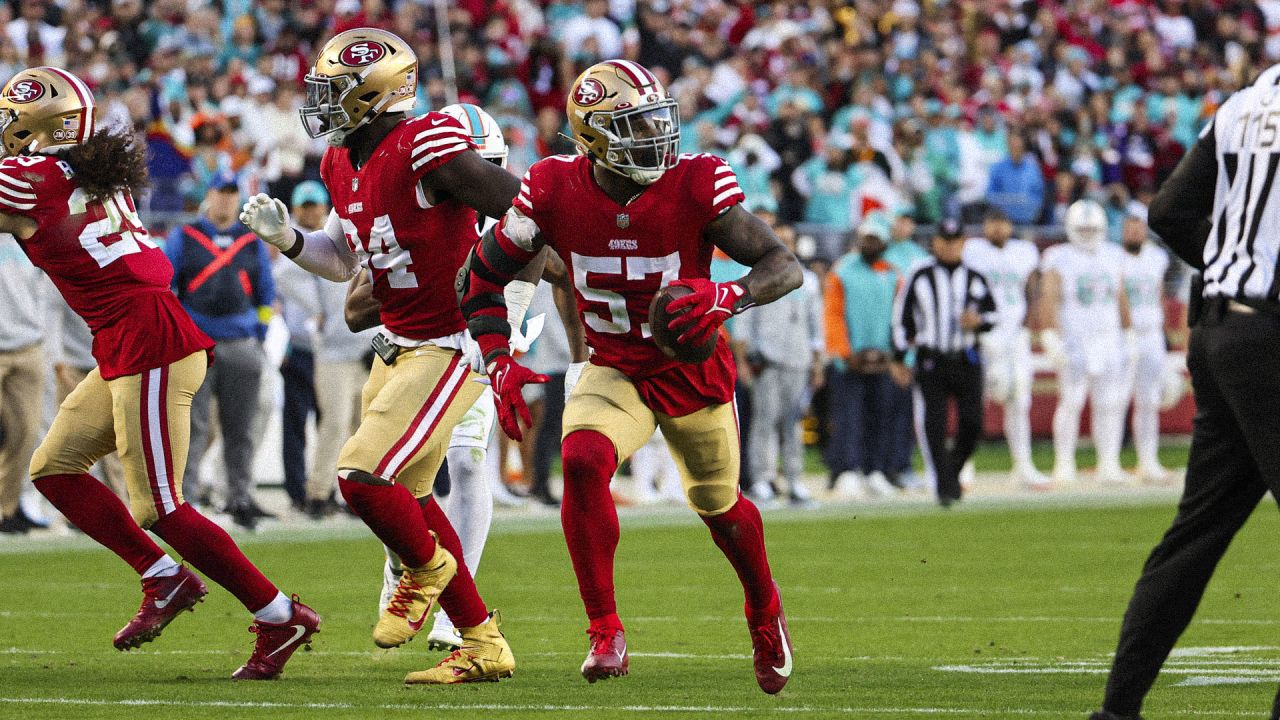 San Francisco 49ers linebacker Dre Greenlaw (57) stands in the rain during  an NFL football game against the Tampa Bay Buccaneers, Sunday, Dec.11,  2022, in Santa Clara, Calif. (AP Photo/Scot Tucker Stock