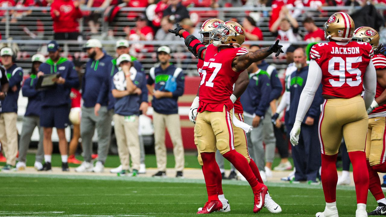 San Francisco 49ers vs. Seattle Seahawks. NFL Game. American Football  League match. Silhouette of professional player celebrate touch down.  Screen in Stock Photo - Alamy