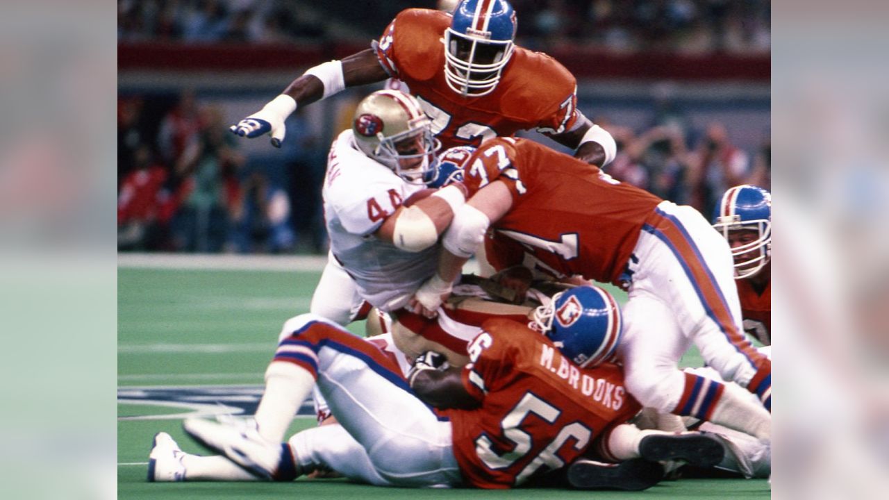 FILE - In this Jan. 28, 1990, file photo, San Francisco 49ers quarterback Joe  Montana throws a pass during the first half against the Denver in Super Bowl  XXIV in New Orleans.