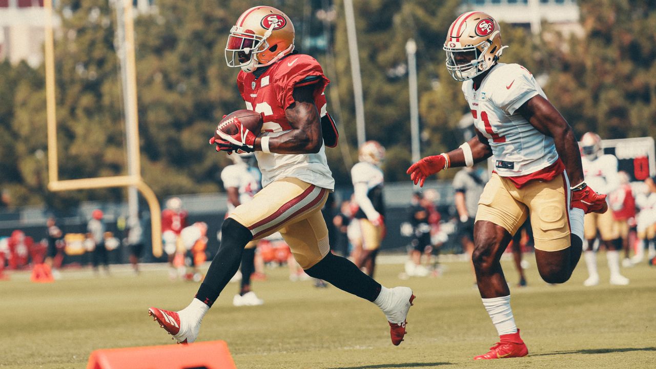 San Francisco 49ers linebackers Dre Greenlaw (57) and Fred Warner (54) warm  up at NFL football training camp in Santa Clara, Calif., Tuesday, Aug. 10,  2021. (AP Photo/Jeff Chiu Stock Photo - Alamy