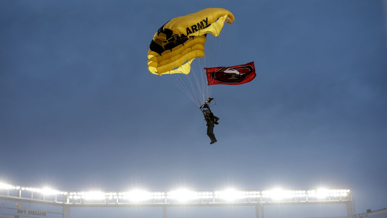 The Golden Knights parachute into the Levis Stadium before the