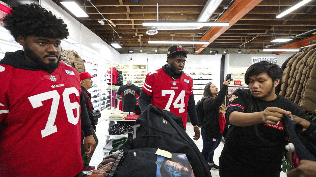 49ers Players Host 15 Students from SPAAT for a Holiday Blitz Shopping Event