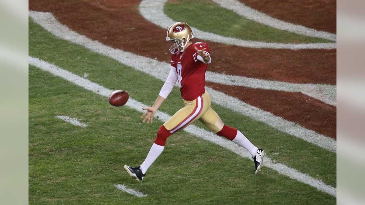 San Francisco 49ers punter Andy Lee kicks a 45-yard punt from the