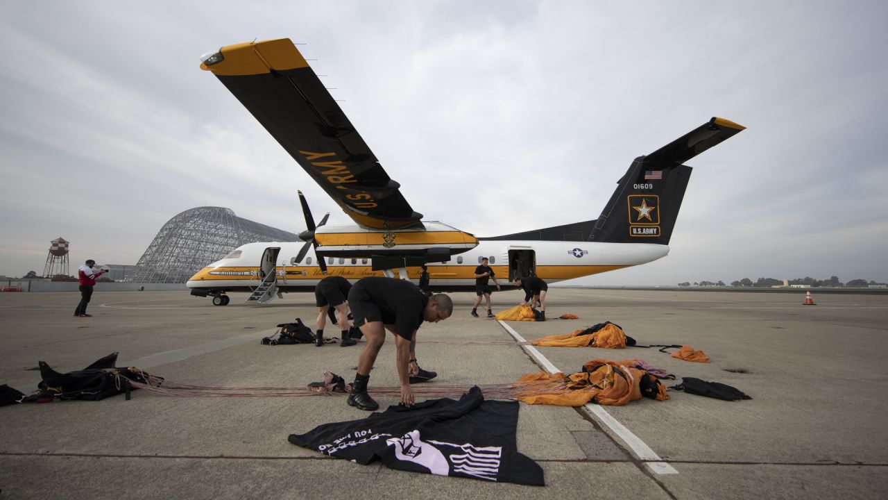 The Golden Knights parachute into the Levis Stadium before the