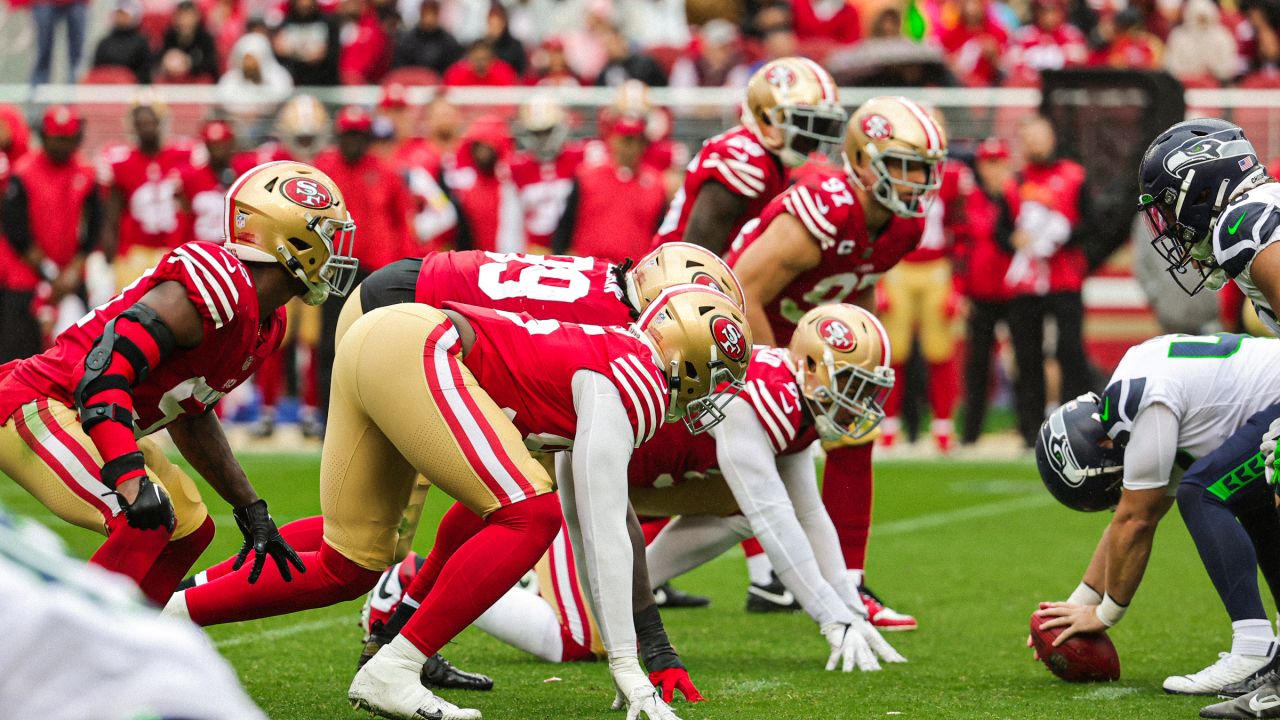 Seattle Seahawks vs. San Francisco 49ers. Fans support on NFL Game.  Silhouette of supporters, big screen with two rivals in background Stock  Photo - Alamy