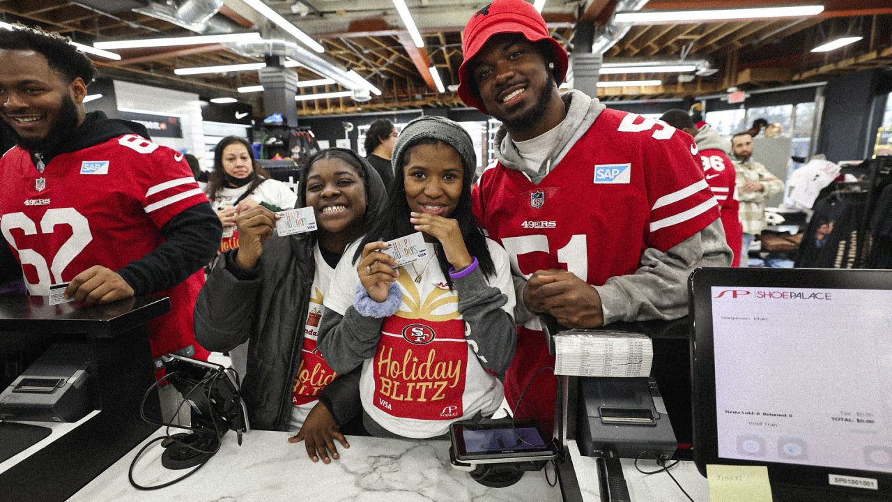 49ers Players Host 15 Students from SPAAT for a Holiday Blitz Shopping Event