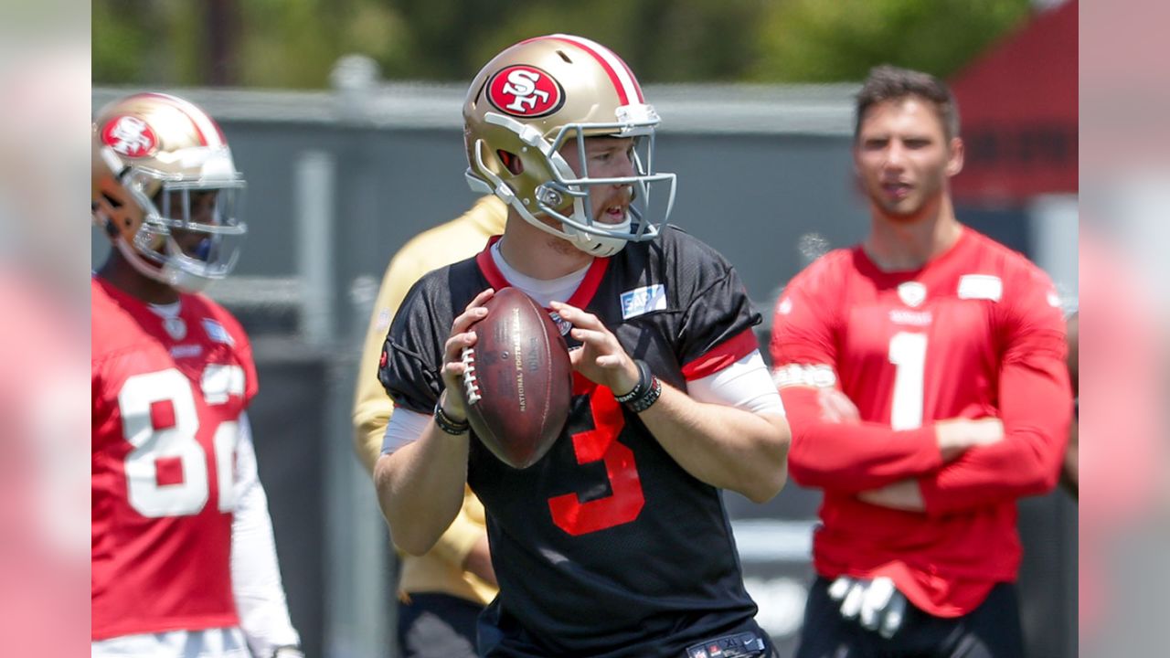 San Francisco 49ers' Jayson DiManche, left, grabs the jersey of Reuben  Foster during practice at an NFL football training camp in Santa Clara,  Calif., Saturday, Aug. 5, 2017. (AP Photo/Jeff Chiu Stock