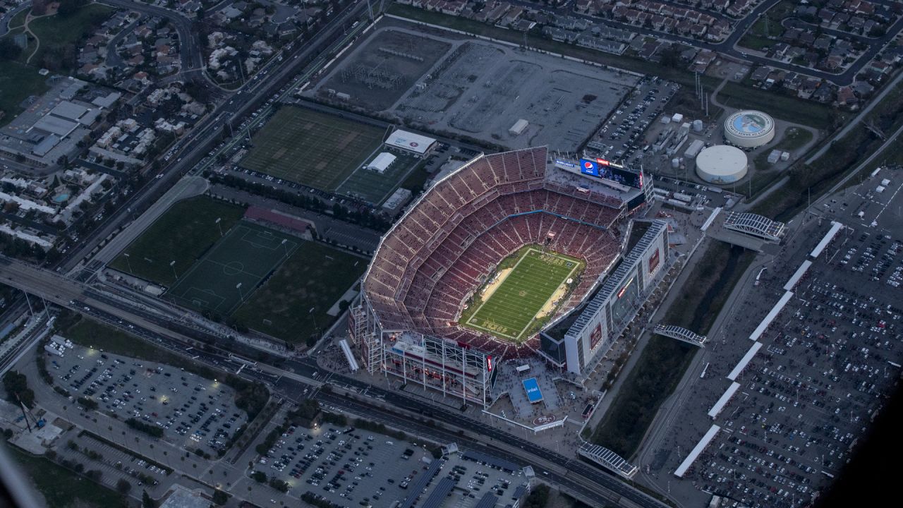 The Golden Knights parachute into the Levis Stadium before the