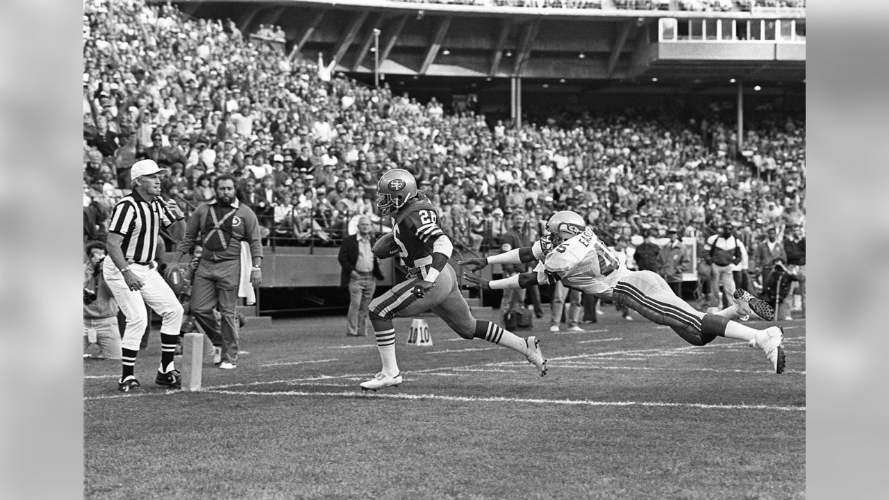 San Francisco 49ers Ronnie Lott pulls down Seattle Seahawks receiver Steve  Largent (80) for a short