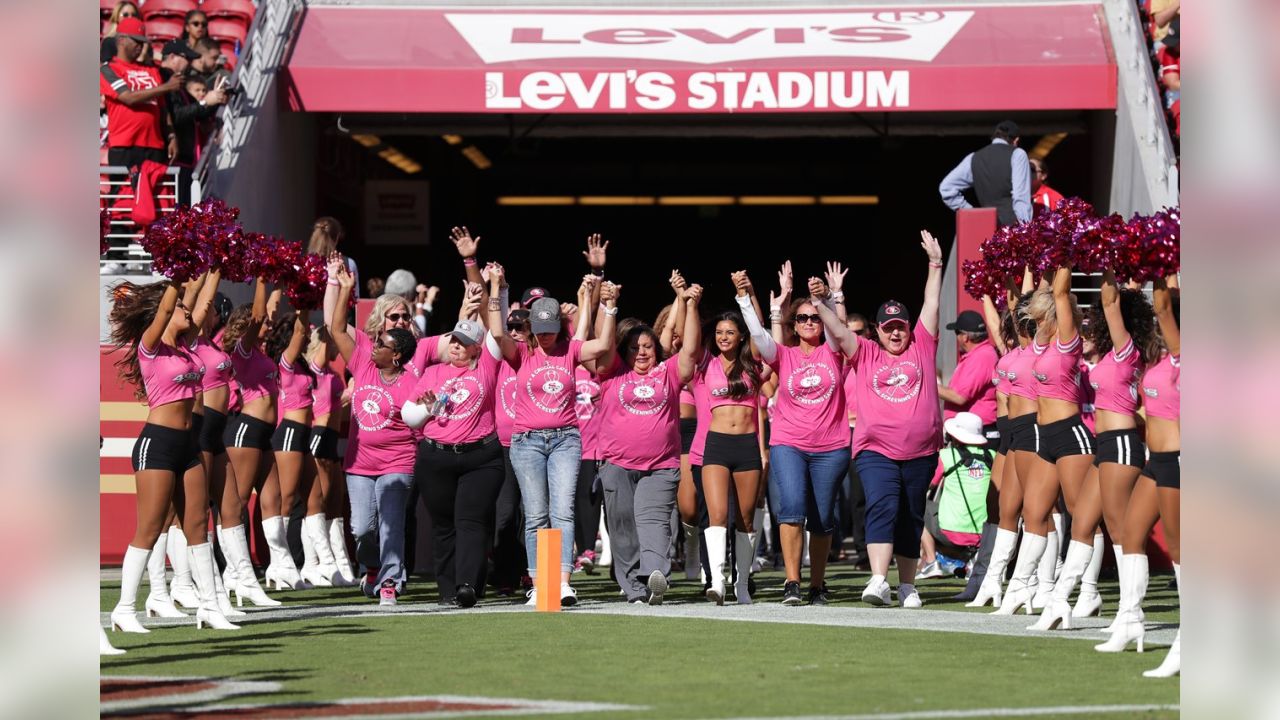 ADO - Broncos Ravens Football Breast cancer survivors bring